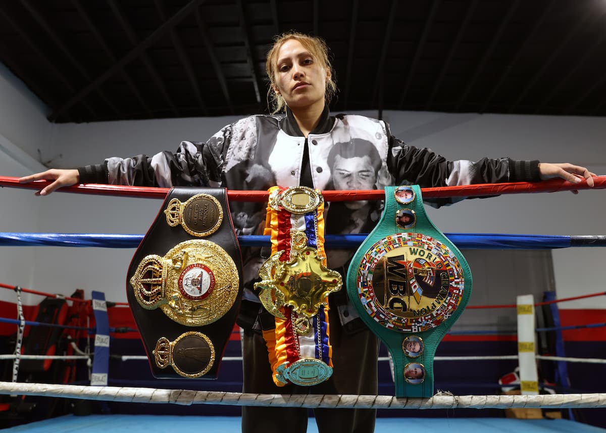 Seniesa Estrada with championship belts