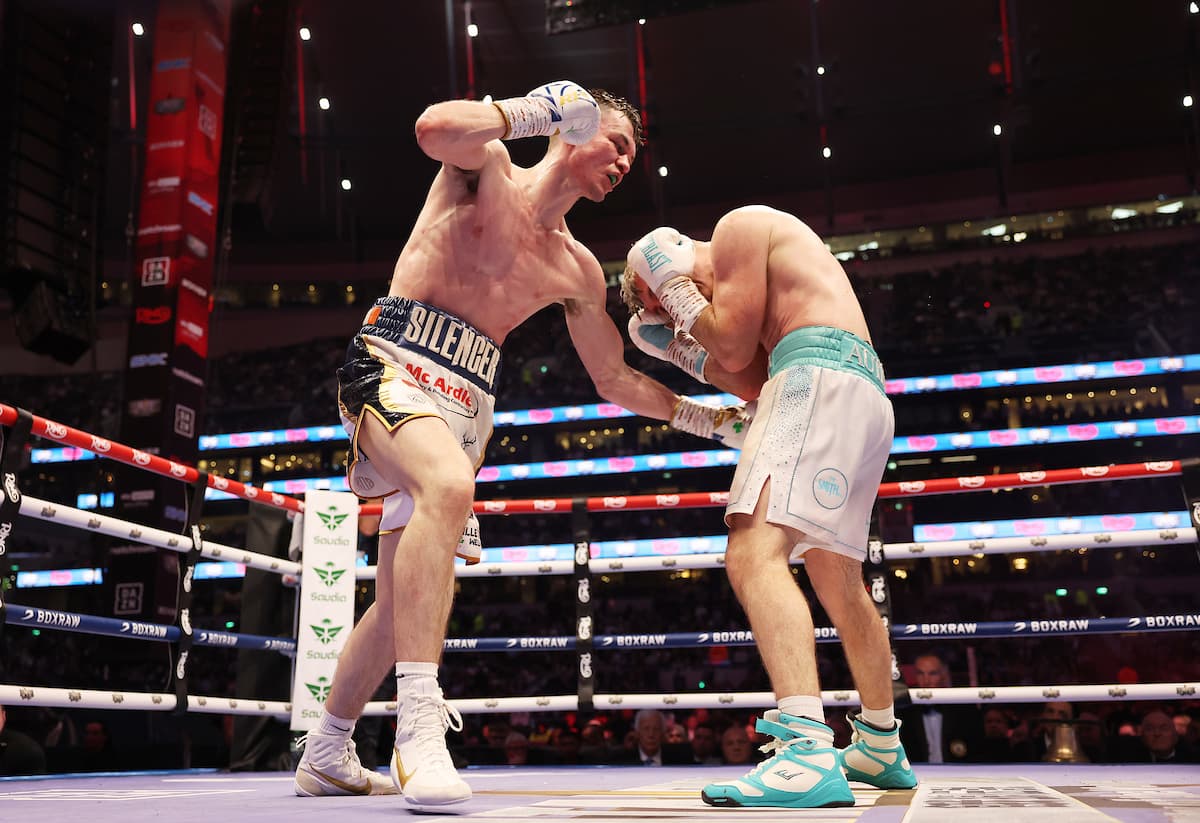 Aaron McKenna punches Liam Smith during their boxing bout