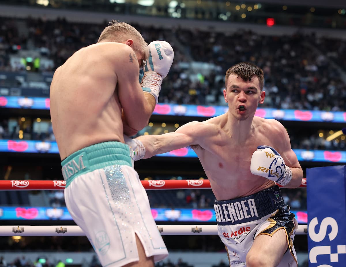 Aaron McKenna punches Liam Smith during their boxing bout