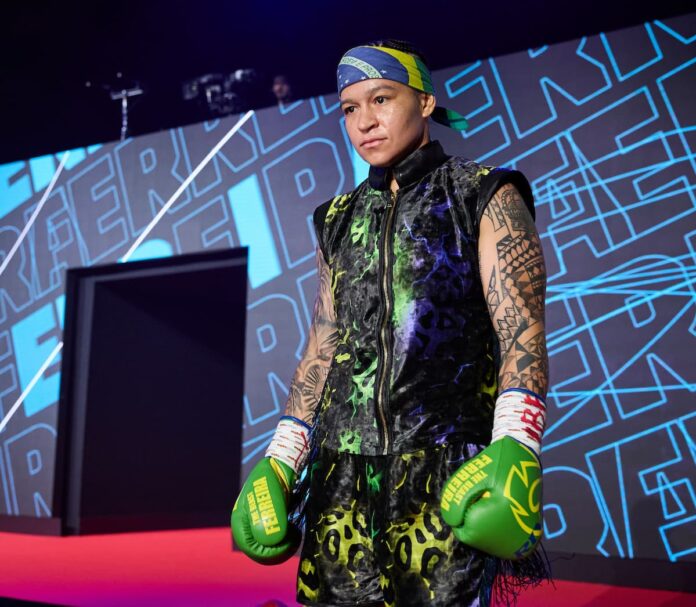 Beatriz Ferreira walks to the ring ahead of her boxing match