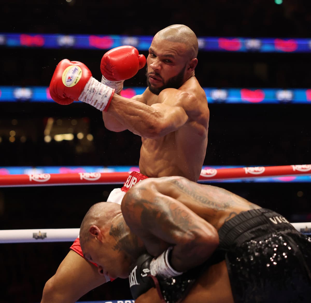 Chris Eubank Jr throws a hook during his bout against Conor Benn