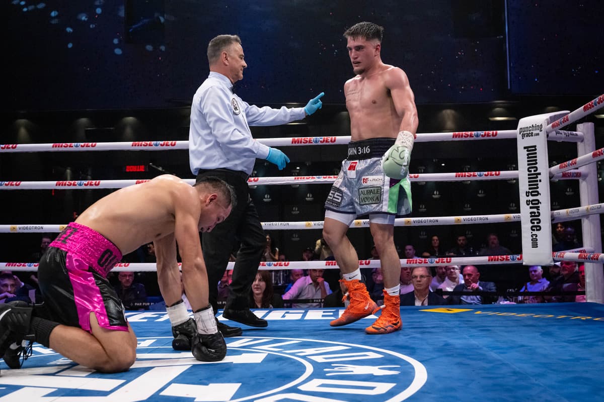 Christopher Guerrero knocks down Oliver Quintana during their boxing bout