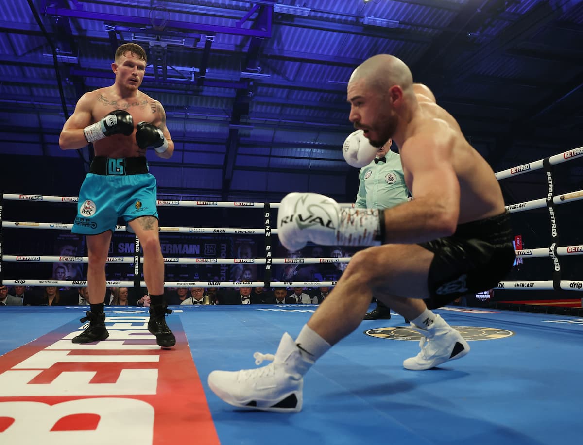 Dalton Smith knocks down Mathieu Germain during their boxing bout