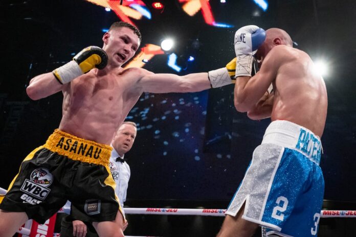 Dzmitry Asanau throws a jab during his bout against Francesco Patera