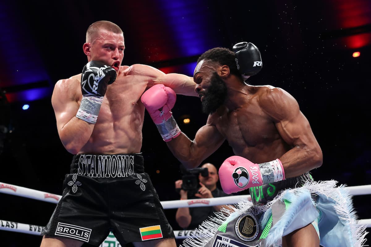 Eimantas Stanionis punches Jaron Ennis during their bout