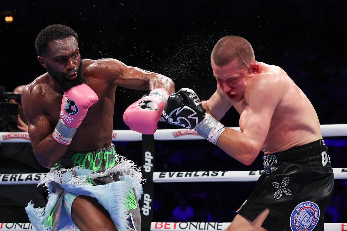 Jaron Ennis punches Eimantas Stanionis during their bout