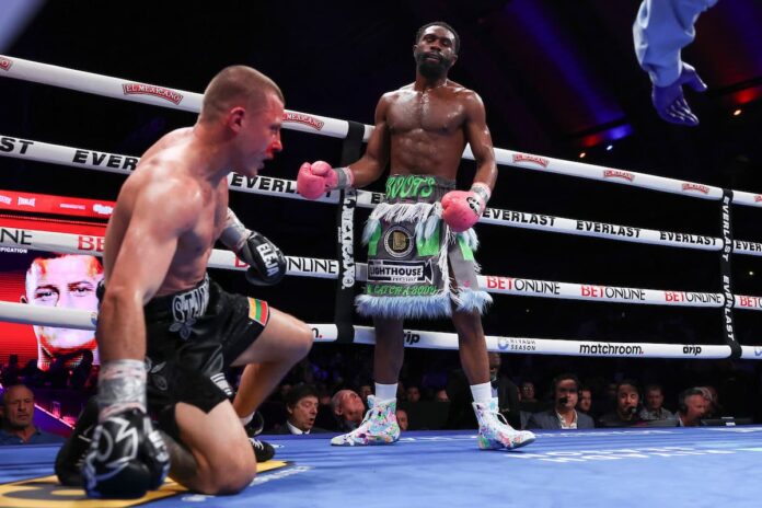 Jaron Ennis knocks down Eimantas Stanionis during their boxing bout