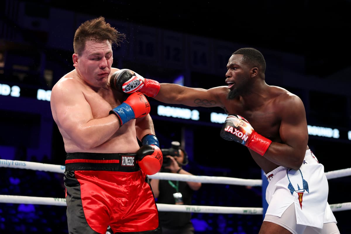 Joshua Edwards punches Larry Gonzales during their bout