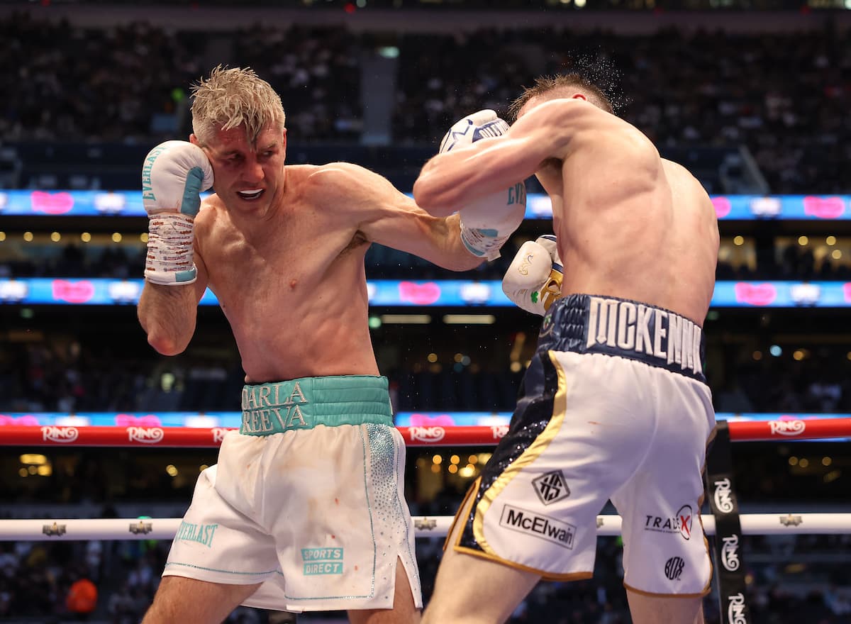 Liam Smith punches Aaron McKenna during their boxing bout