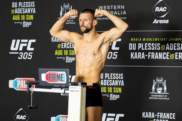 Mateusz Gamrot at the weigh-in ahead of his bout against Dan Hooker at UFC 305