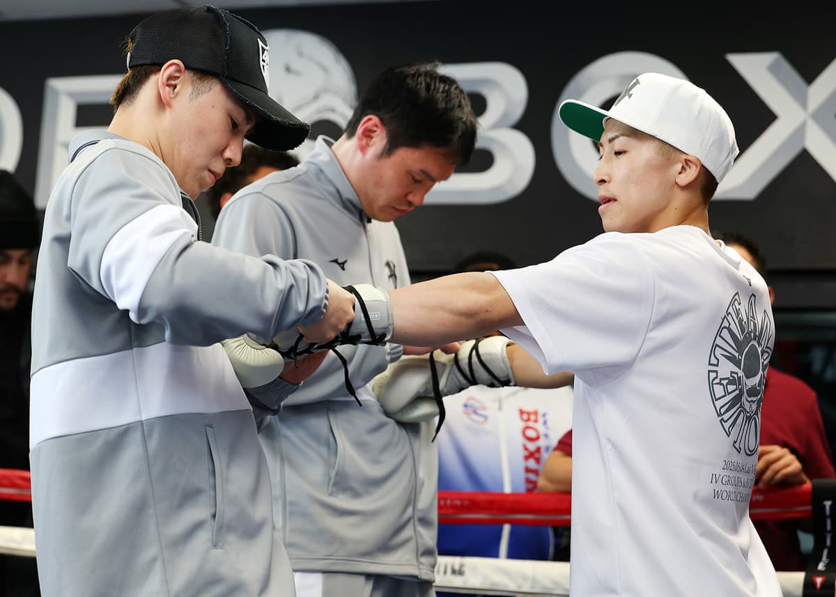 Naoya Inoue getting gloved up during a media workout ahead of his bout against Ramon Cardenas