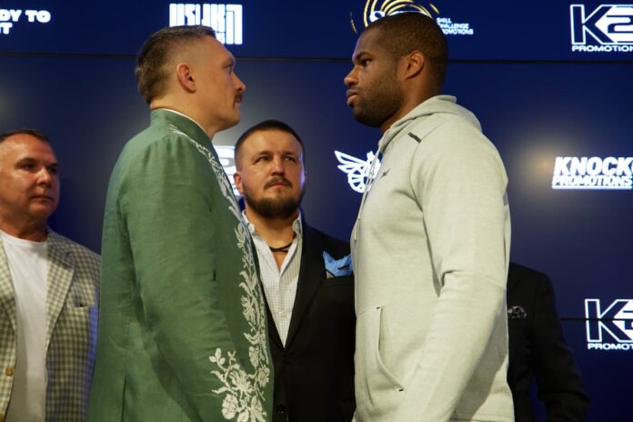 Oleksandr Usyk and Daniel Dubois face off at the press conference ahead of their boxing bout