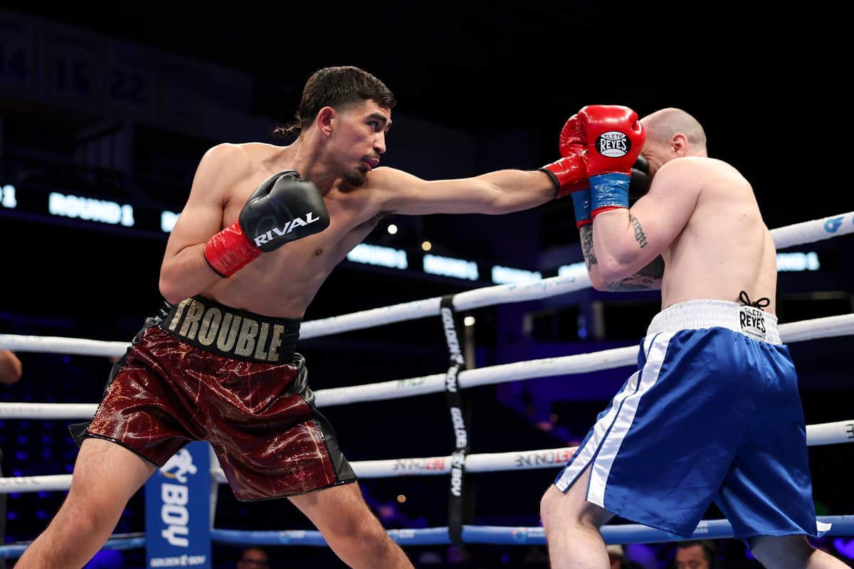 Samuel Castellanos punches Marc Misiura during their bout