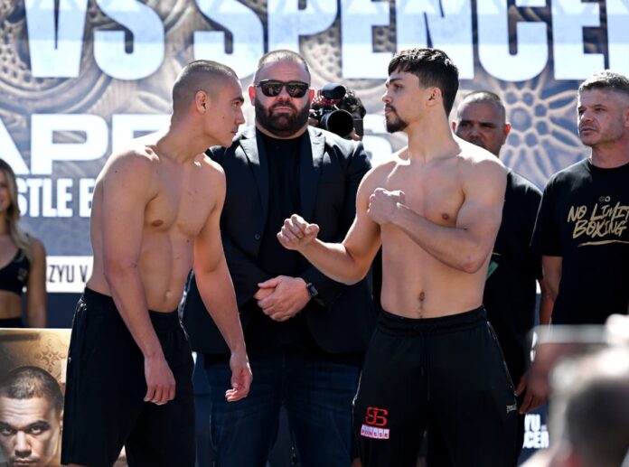 Tim Tszyu and Joey Spencer face each other at the weigh-in before their boxing bout in Newcastle, NSW, Australia