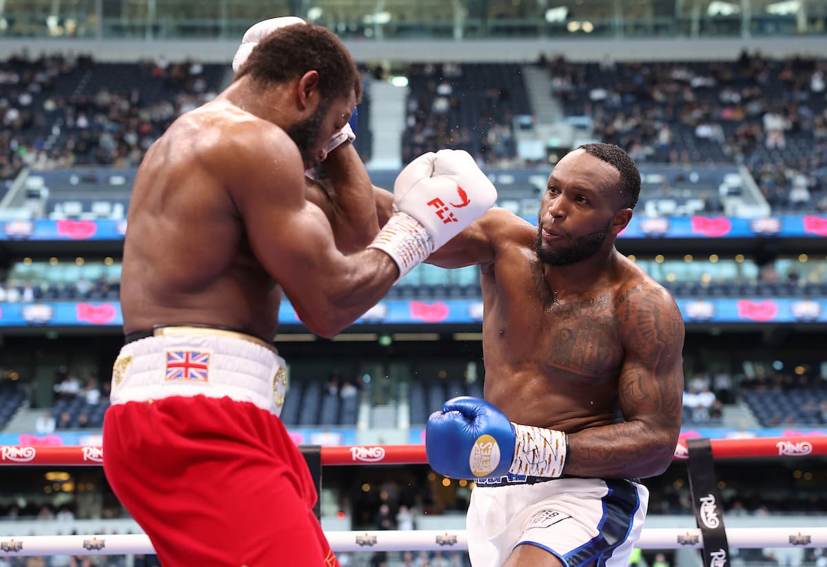 Viddal Riley punches Cheavon Clarke during their boxing bout