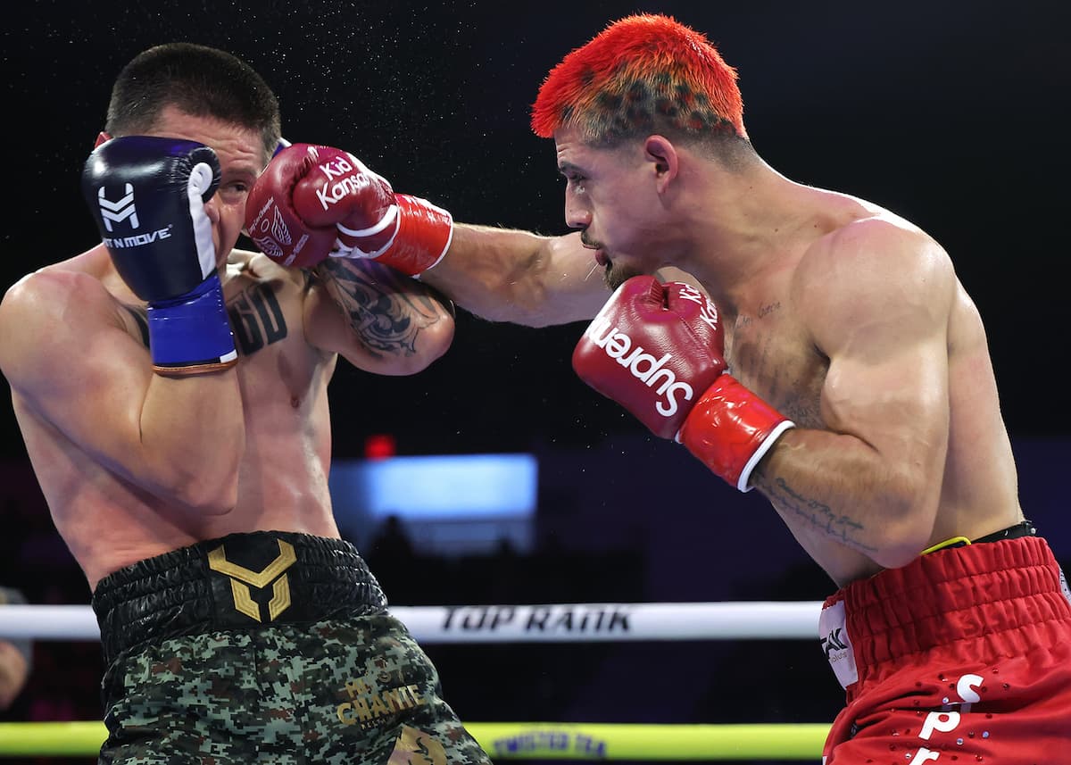 Alan Garcia punches Cristian Medina Garcia during their boxing bout at Pechanga Arena San Diego