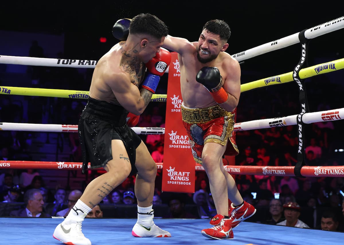 Andres Cortes punches Salvador Jimenez during their boxing bout at Pechanga Arena San Diego