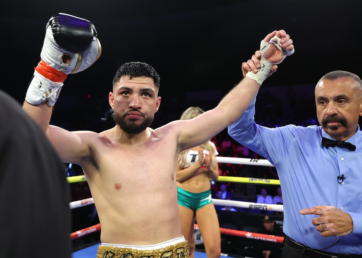 Andres Cortes victorious over Salvador Jimenez in their boxing bout at Pechanga Arena San Diego