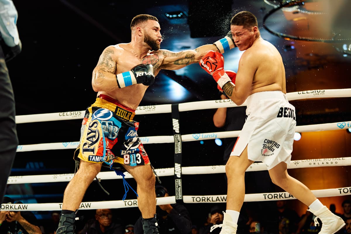Ariel Perez throws a jab in his bout against Mario Bedolla Orozco during Most Valuable Prospects 12 in Orlando, Florida