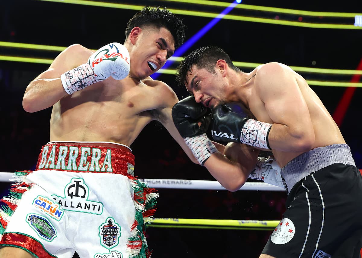 Art Barrera Jr punches Juan Carlos Guerra Jr during their boxing bout in Las Vegas