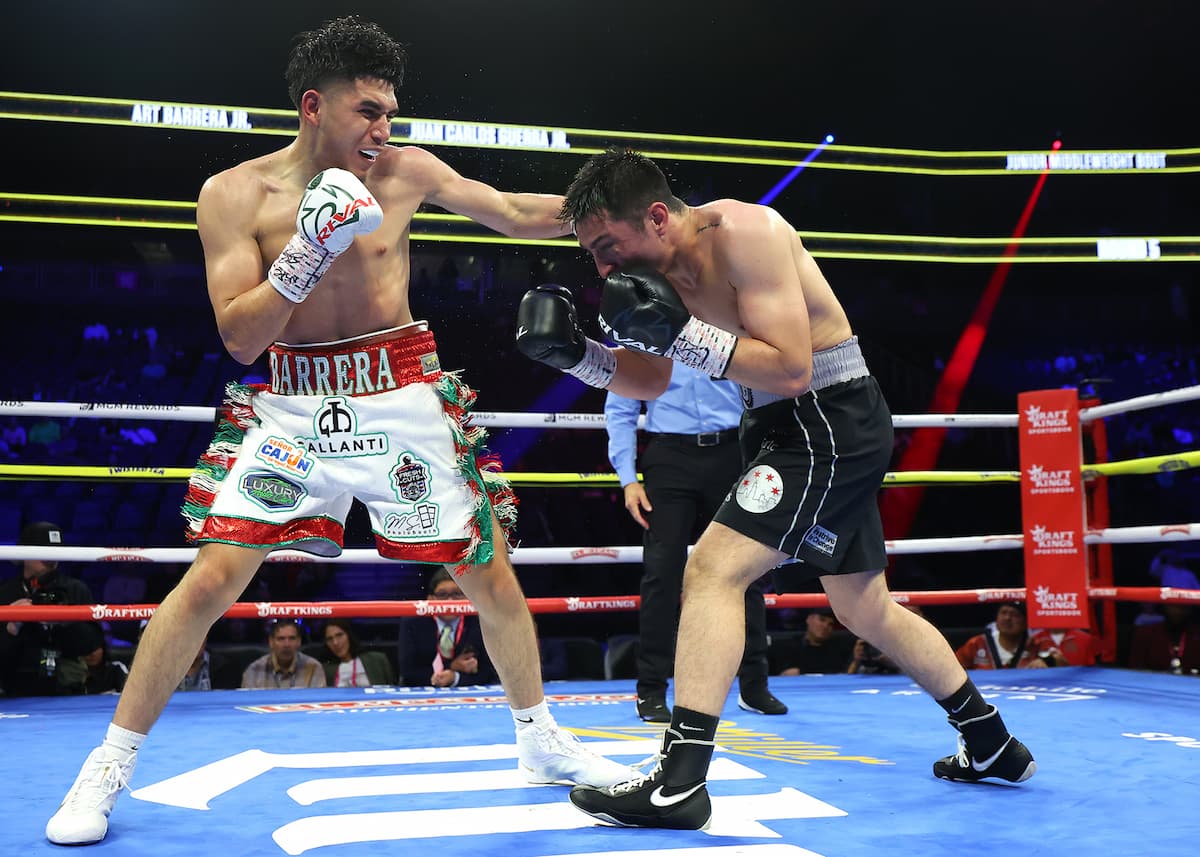 Art Barrera Jr punches Juan Carlos Guerra Jr during their boxing bout in Las Vegas