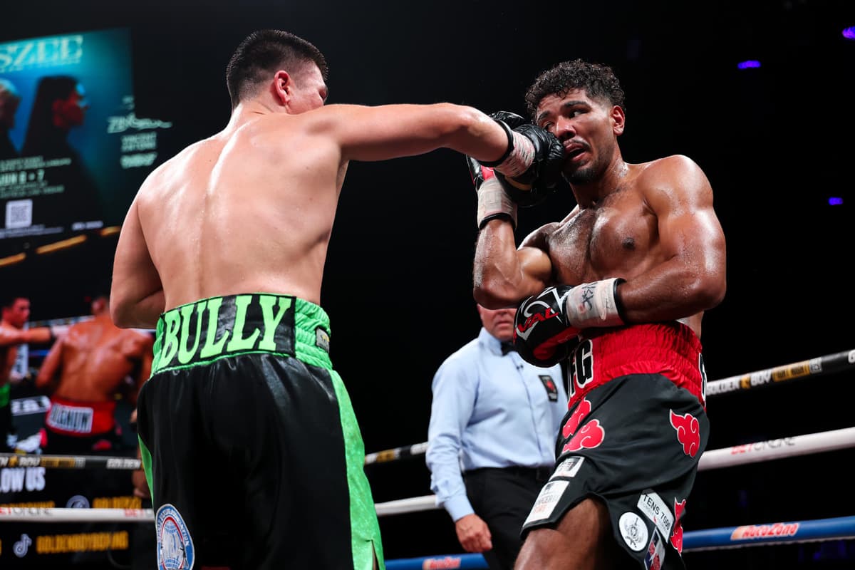 Bektemir Melikuziev punches Darius Fulghum during their boxing bout in Las Vegas