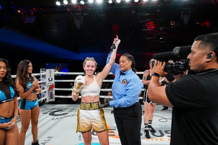 Referee raises Bree Howling’s hand in victory after defeating Beata Dudek at MVP 8 in Orlando, Florida