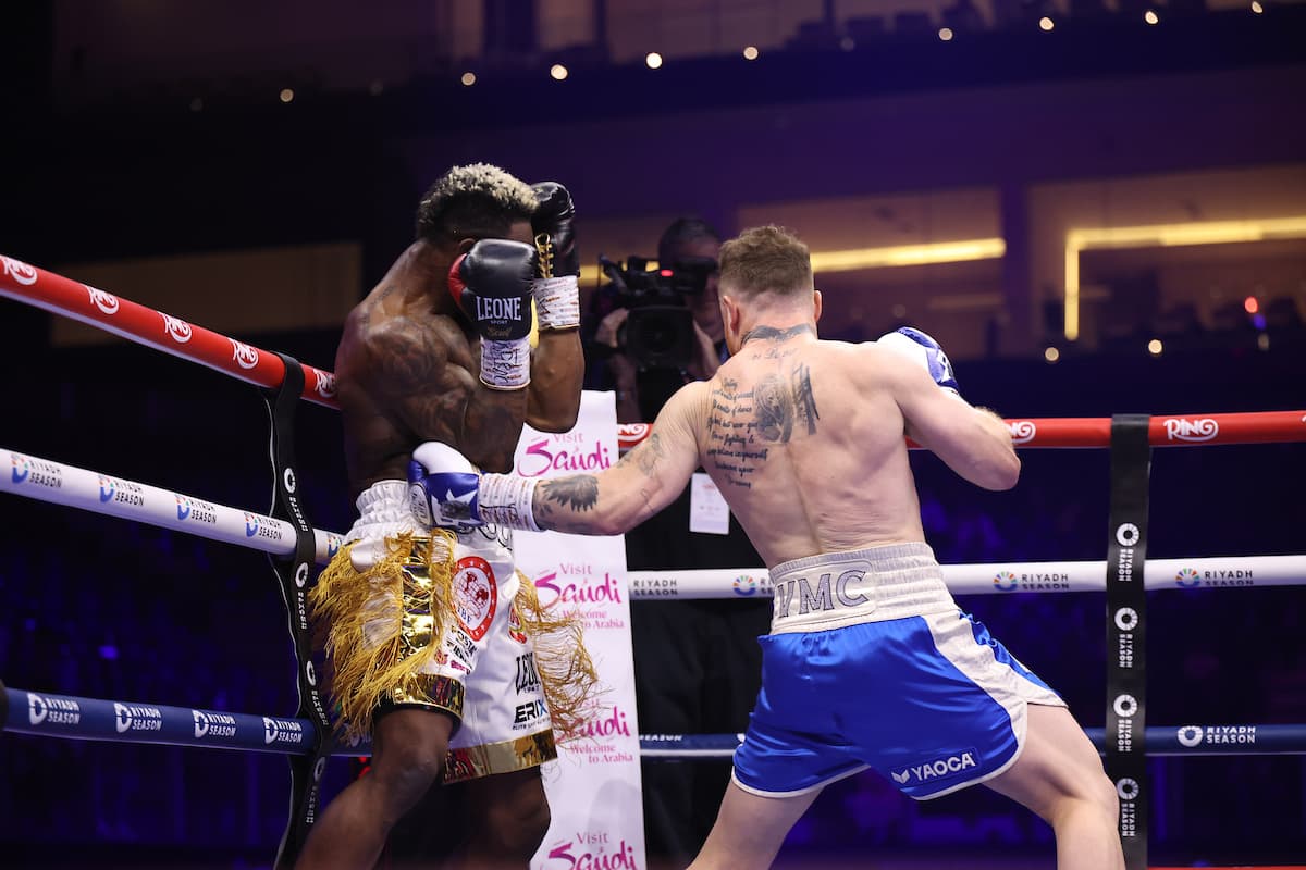 Canelo Alvarez lands a punch to the body during his bout against William Scull
