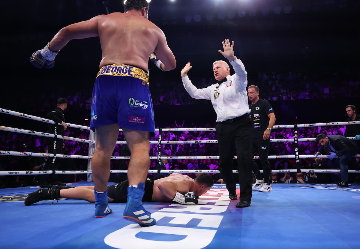 David Allen knocks down Johnny Fisher during their rematch in London