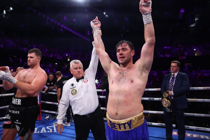 David Allen victorious over Johnny Fisher during their boxing rematch in London