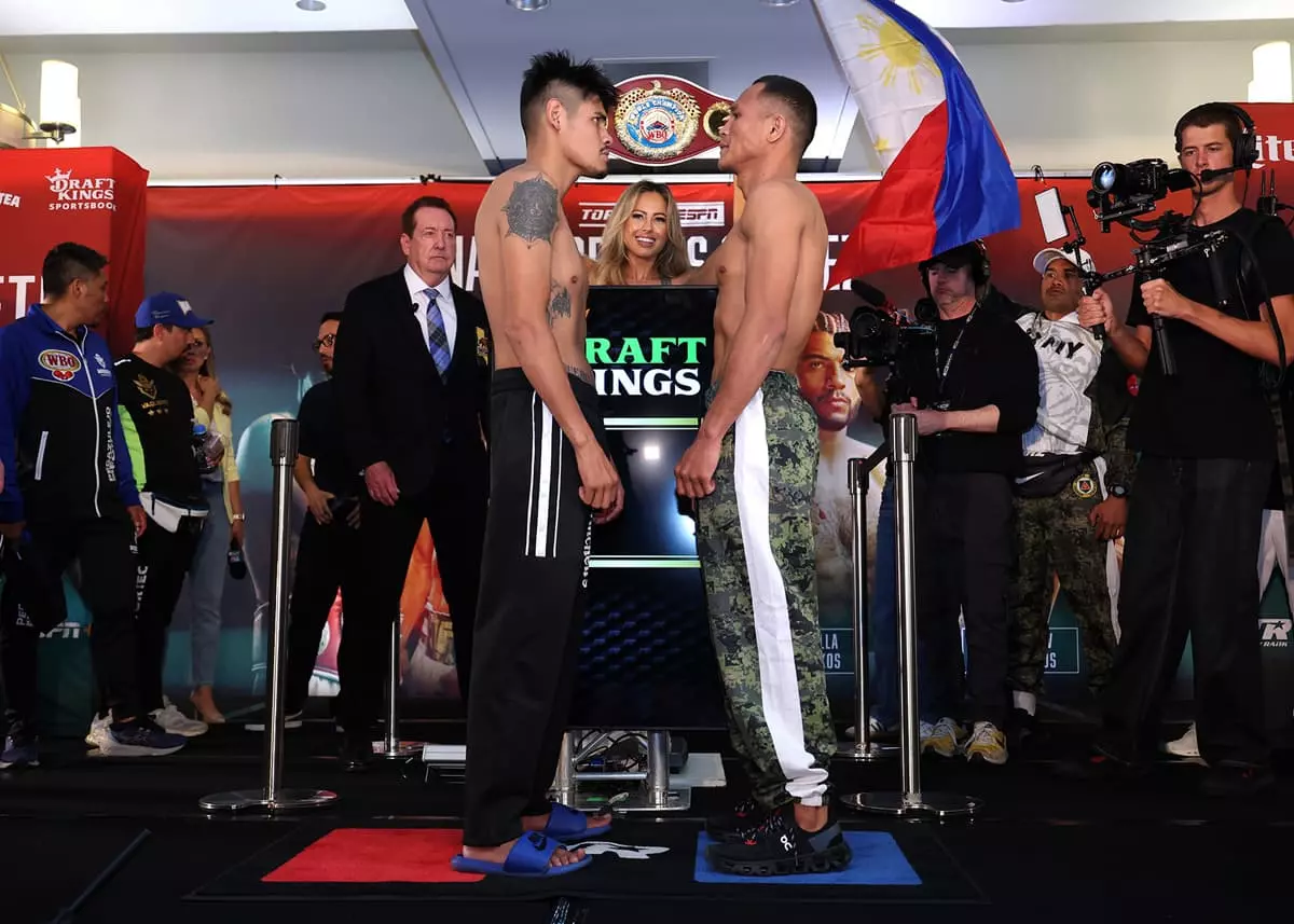Emanuel Navarrete and Charly Suarez come face-to-face at the weigh-in ahead of their bout