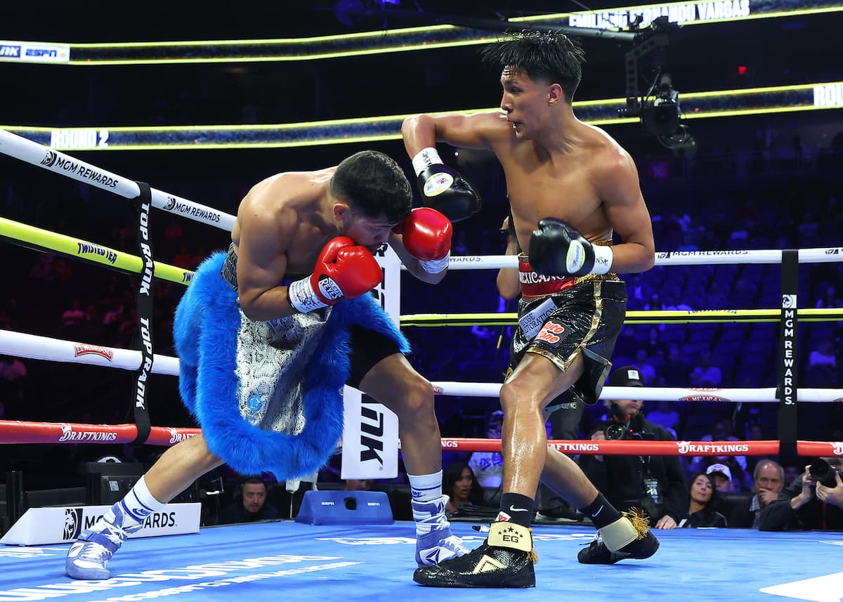 Emiliano Vargas punches Juan Leon during their boxing bout in Las Vegas
