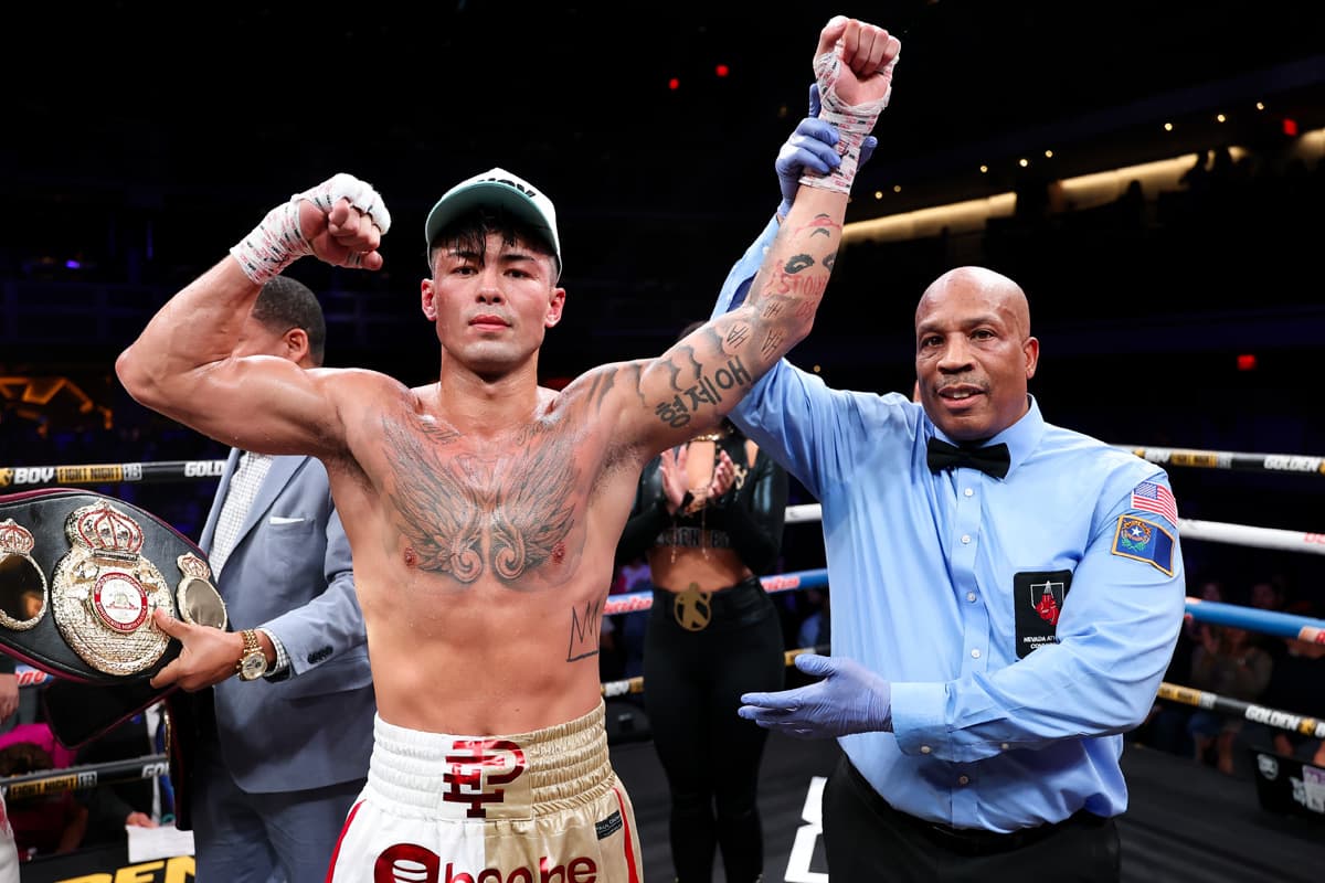 Referee Allen Huggins raises Eric Priest's hand after his victory over Luis Arias in Las Vegas
