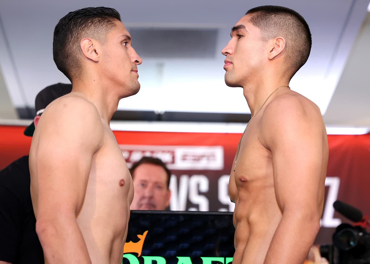 Giovani Santillan and Angel Beltran come face-to-face at the weigh-in ahead of their bout