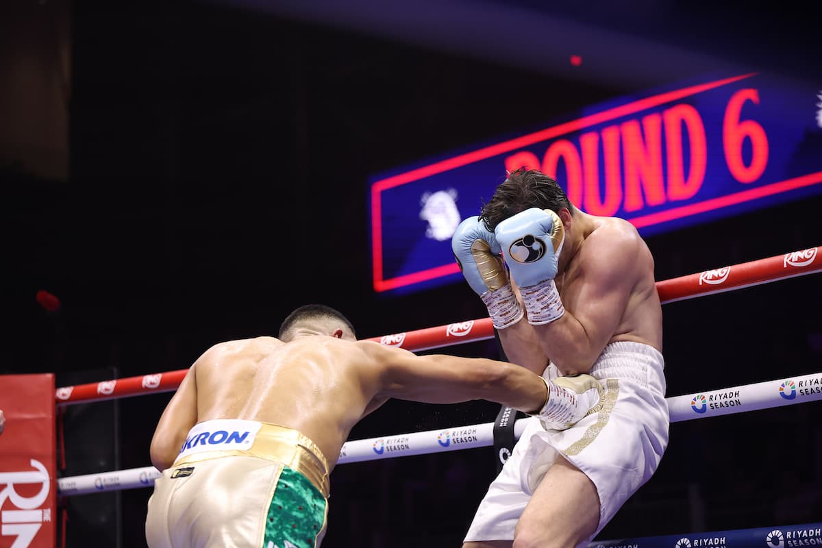Jaime Munguia punches Bruno Surace during their bout