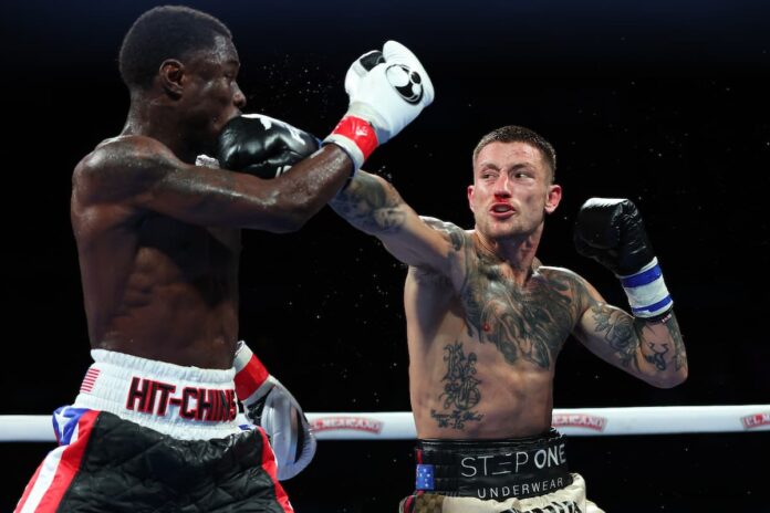 Liam Paro throws a jab during his boxing bout against Richardson Hitchins in Puerto Rico