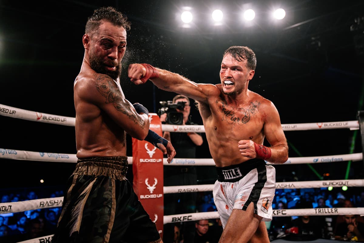 Logan Speyrer punches Quentin Gaskins during their bout at BKFC Clearwater