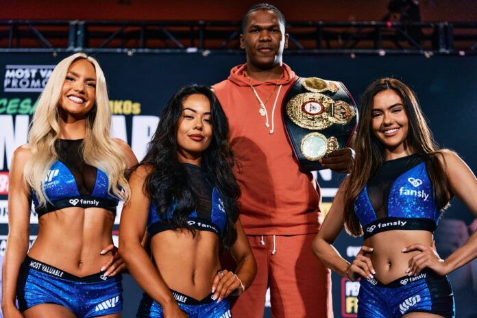 Dainier Pero poses with MVP ring girls Marissa Ayers, Delia Sylvain, and Raphaela Milagres during the MVP 12 weigh-in event, ahead of his fight against Cesar Navarro at Caribe Royale Orlando