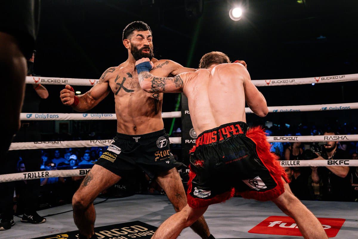 Michael Larrimore punches Samuel Samples during their bout at BKFC Clearwater
