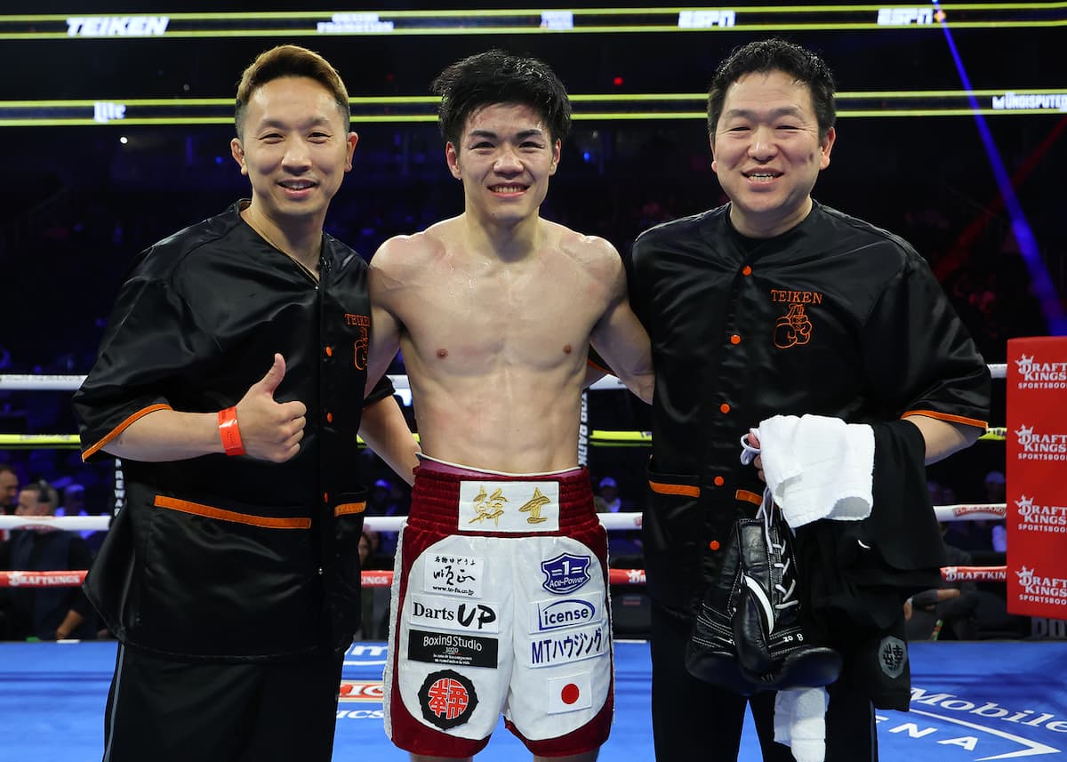 Mikito Nakano with his team after his victory in a boxing match against Pedro Marquez