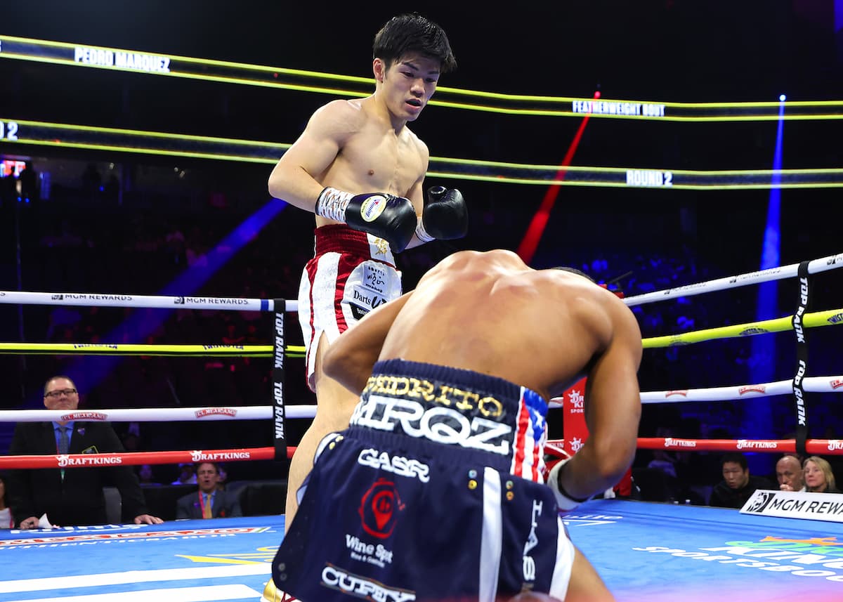 Mikito Nakano knocks down Pedro Marquez during their boxing bout in Las Vegas