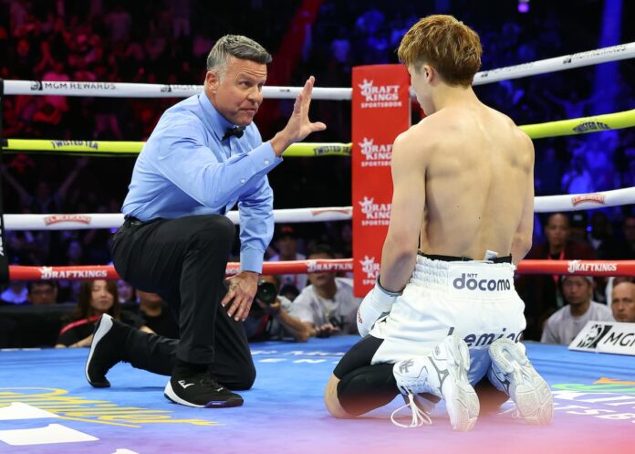 Naoya Inoue suffers a knockdown during his title defense against Ramon Cardenas