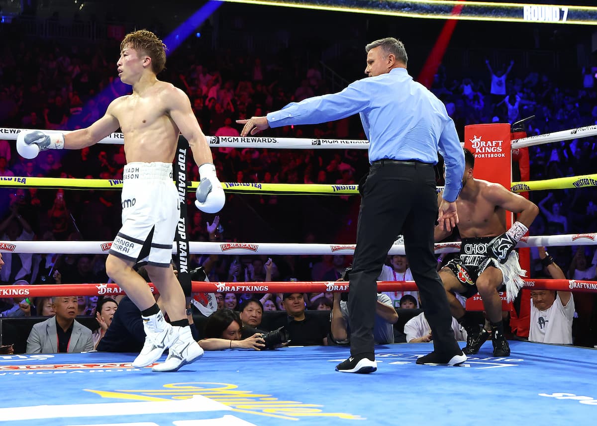 Naoya Inoue knocks down Ramon Cardenas during their boxing bout in Las Vegas