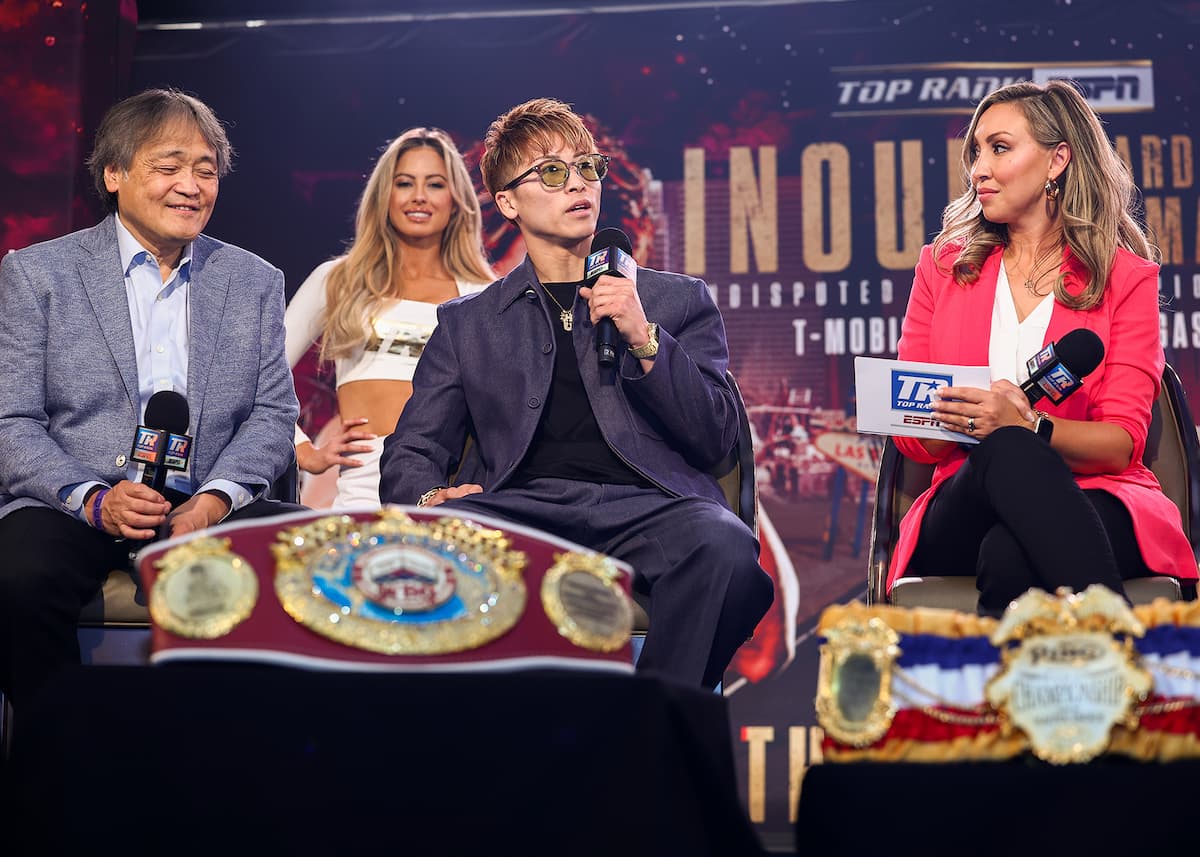 Naoya Inoue speaks to Crystina Poncher during the press conference before his fight against Ramon Cardenas