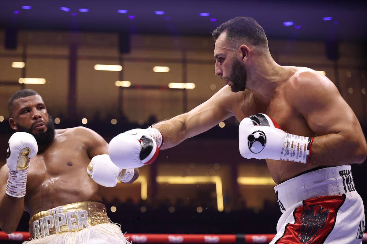 Noel Mikaelian throws a punch during his bout against Badou Jack