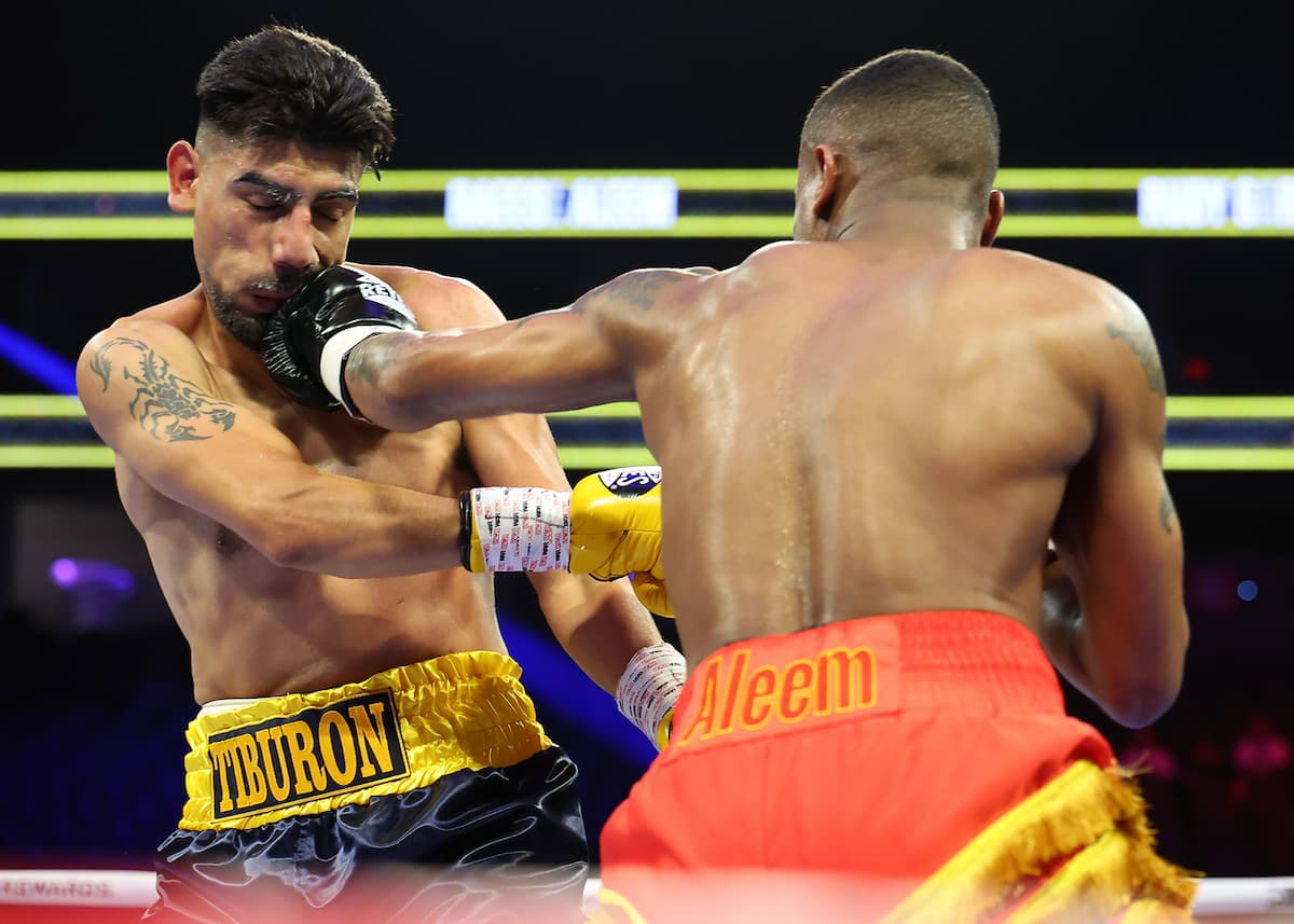 Raeese Aleem punches Rudy Garcia during their boxing bout in Las Vegas