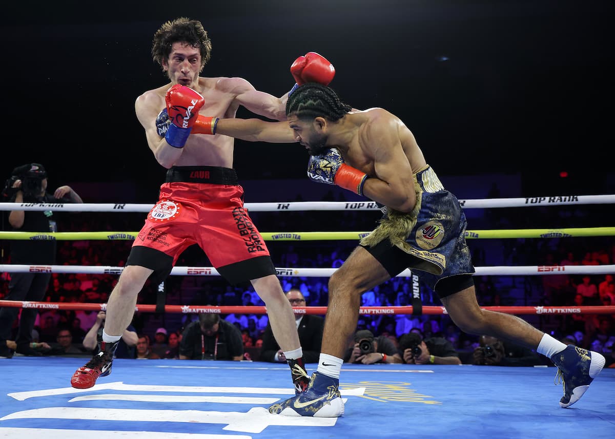 Raymond Muratalla throws a punch during his bout against Zaur Abdullaev at Pechanga Arena San Diego