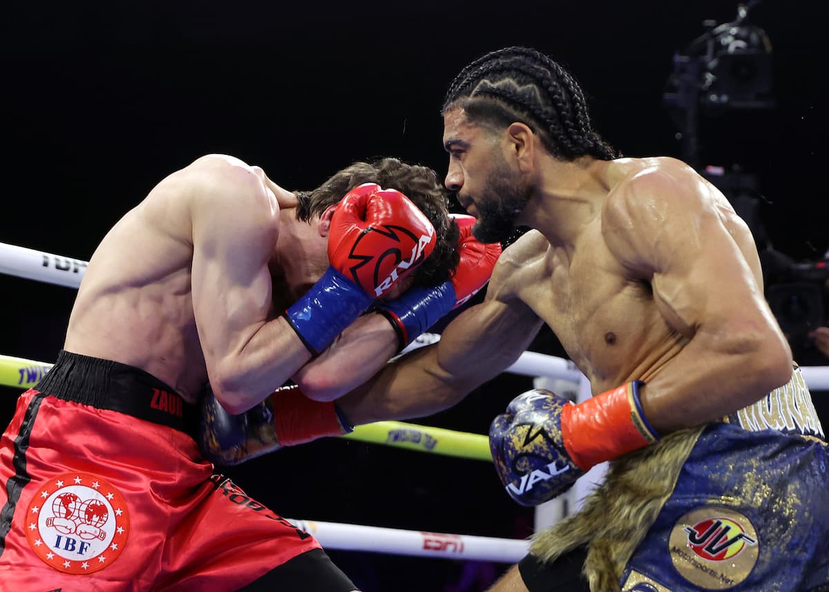 Raymond Muratalla punches Zaur Abdullaev during their boxing bout at Pechanga Arena San Diego