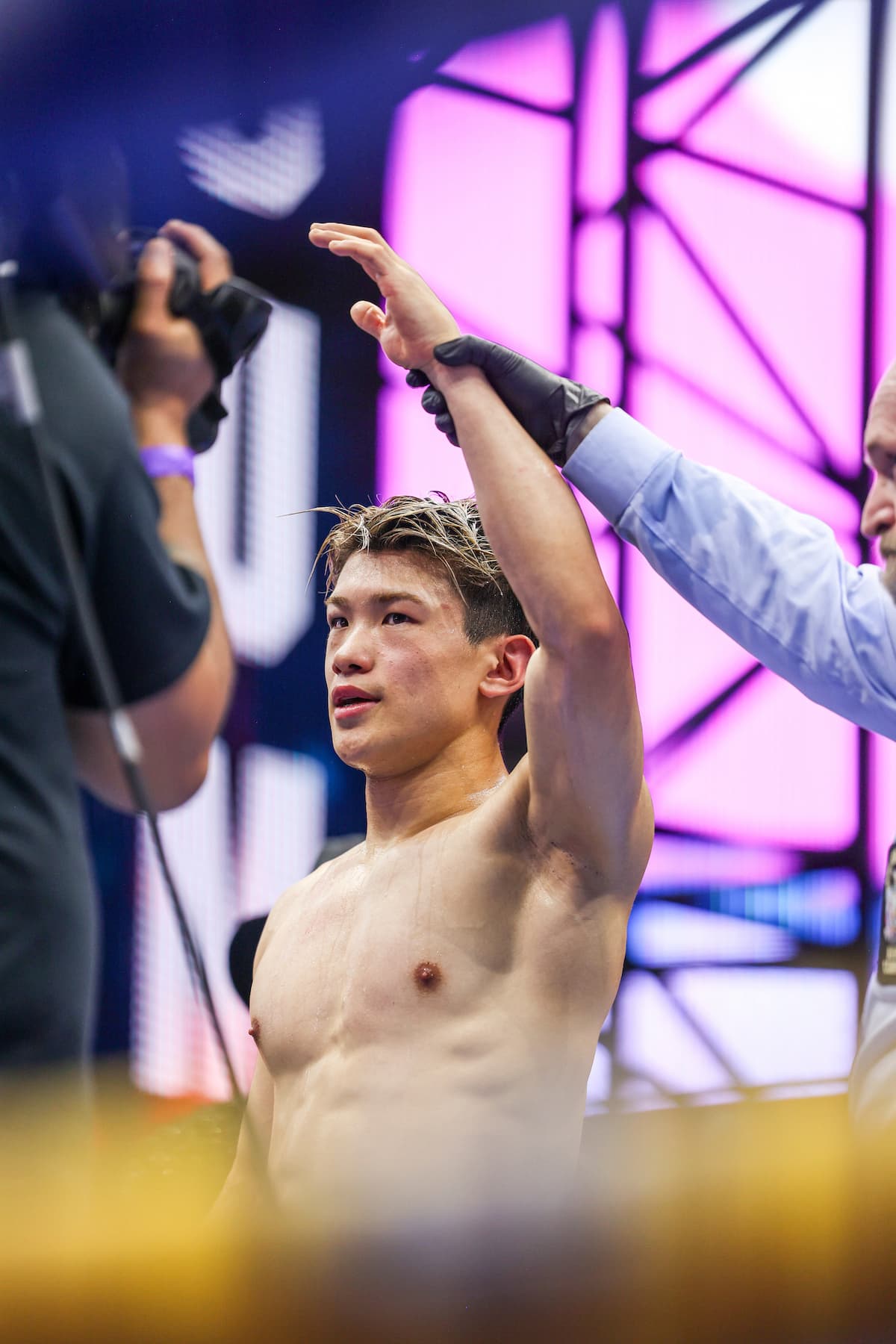 Reito Tsutsumi victorious over Levale Whittington in their boxing bout at Times Square in New York City