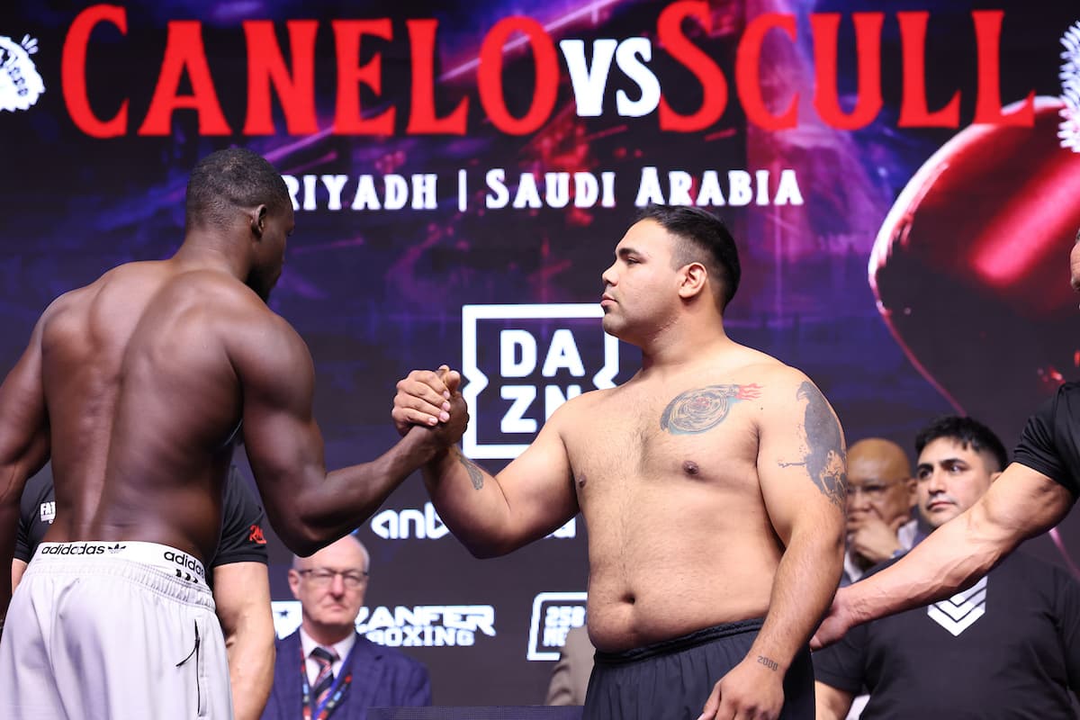 Richard Riakporhe and Kevin Nicolas Espindola shake hands at the weigh-in ahead of their boxing bout